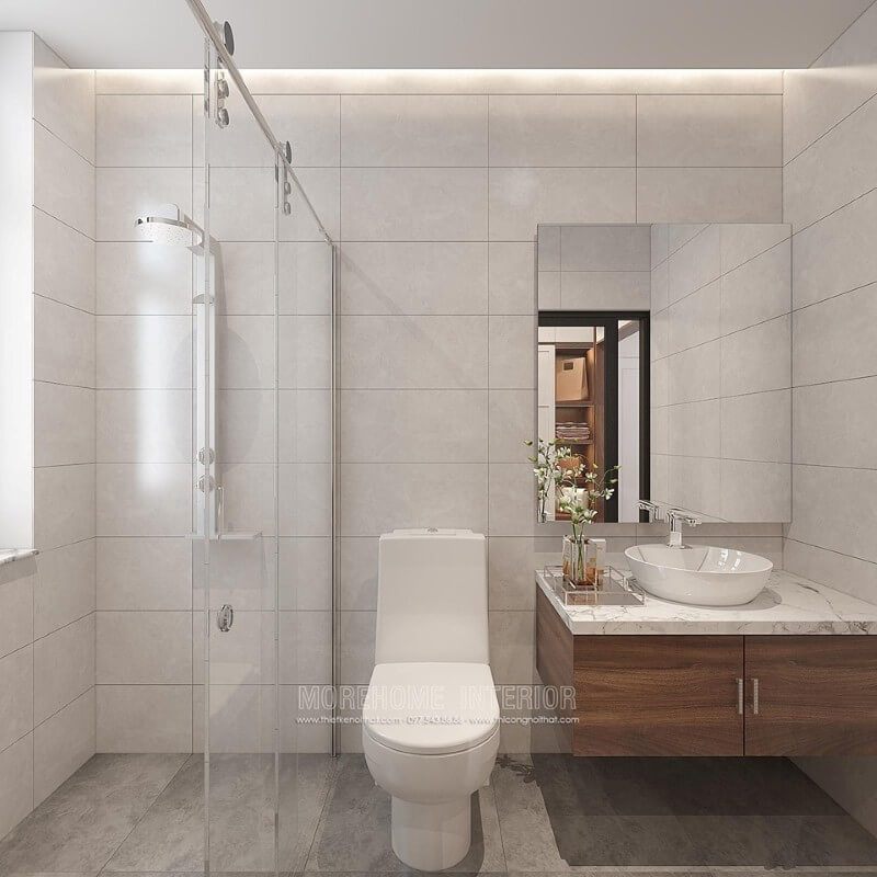 Thiết kế phòng tắm đẹp và hiện đại với ý tưởng sử dụng gam màu đơn sắc màu xám chủ đạo kết hợp chất liệu gỗ óc chó. Mẫu thiết kế sẽ là lựa chọn rất phù hợp trong các không gian vừa và nhỏ như chung cư, nhà phố, nhà liền kề,..