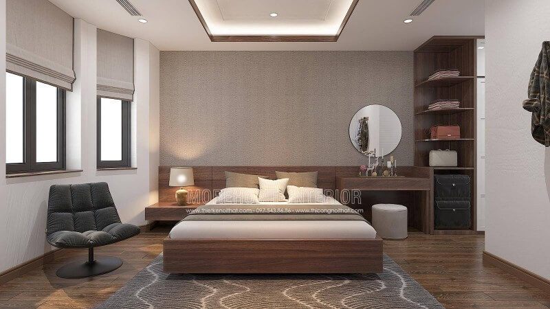 Nếu bạn là người ưa thích sự nhẹ nhàng trầm lắng thì thiết kế nội thất phòng ngủ sử dụng gam màu gỗ nâu lại là sự lựa chọn khá hoàn hảo. Cách bố trí nội thất khá tinh tế dành cho nhà phố, biệt thự được kết hợp hài hòa giữa sự tinh gọn vuông vắn cùng đường cong nhẹ nhàng trong chiếc gương tròn trang điểm, chiếc đèn ngủ chụp cong và khối trụ ghế.